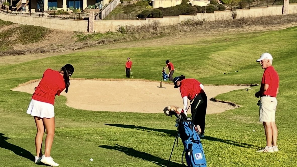 Students training around a bunker